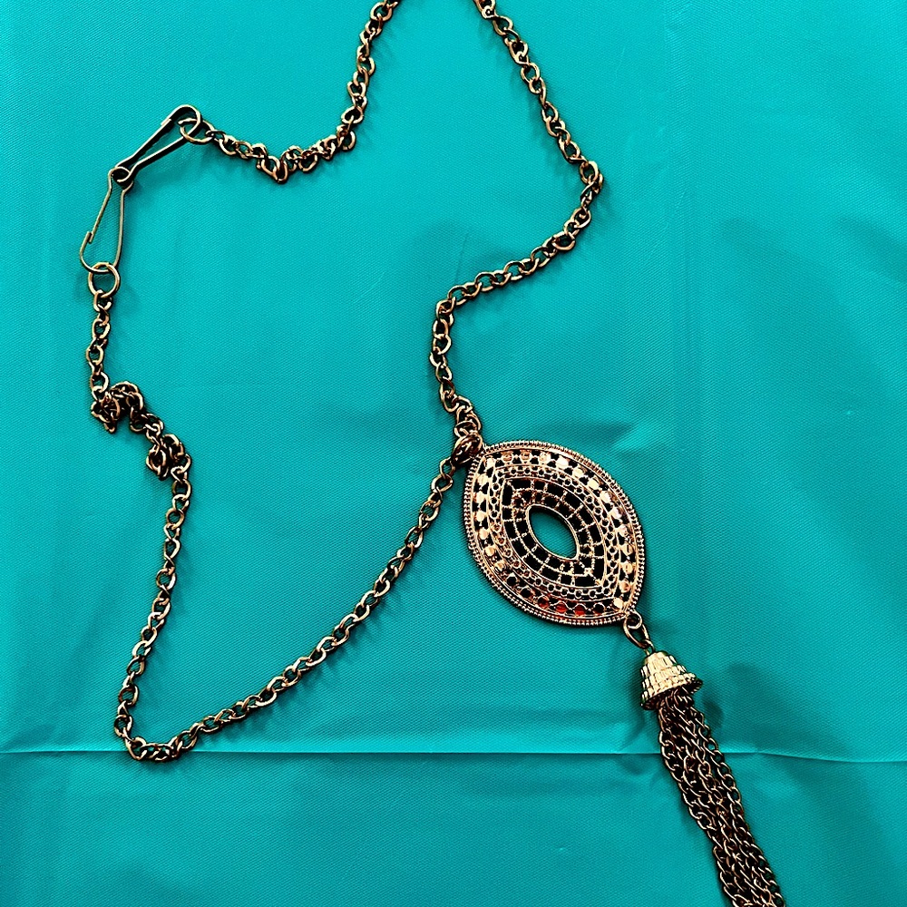 Gold toned pendant